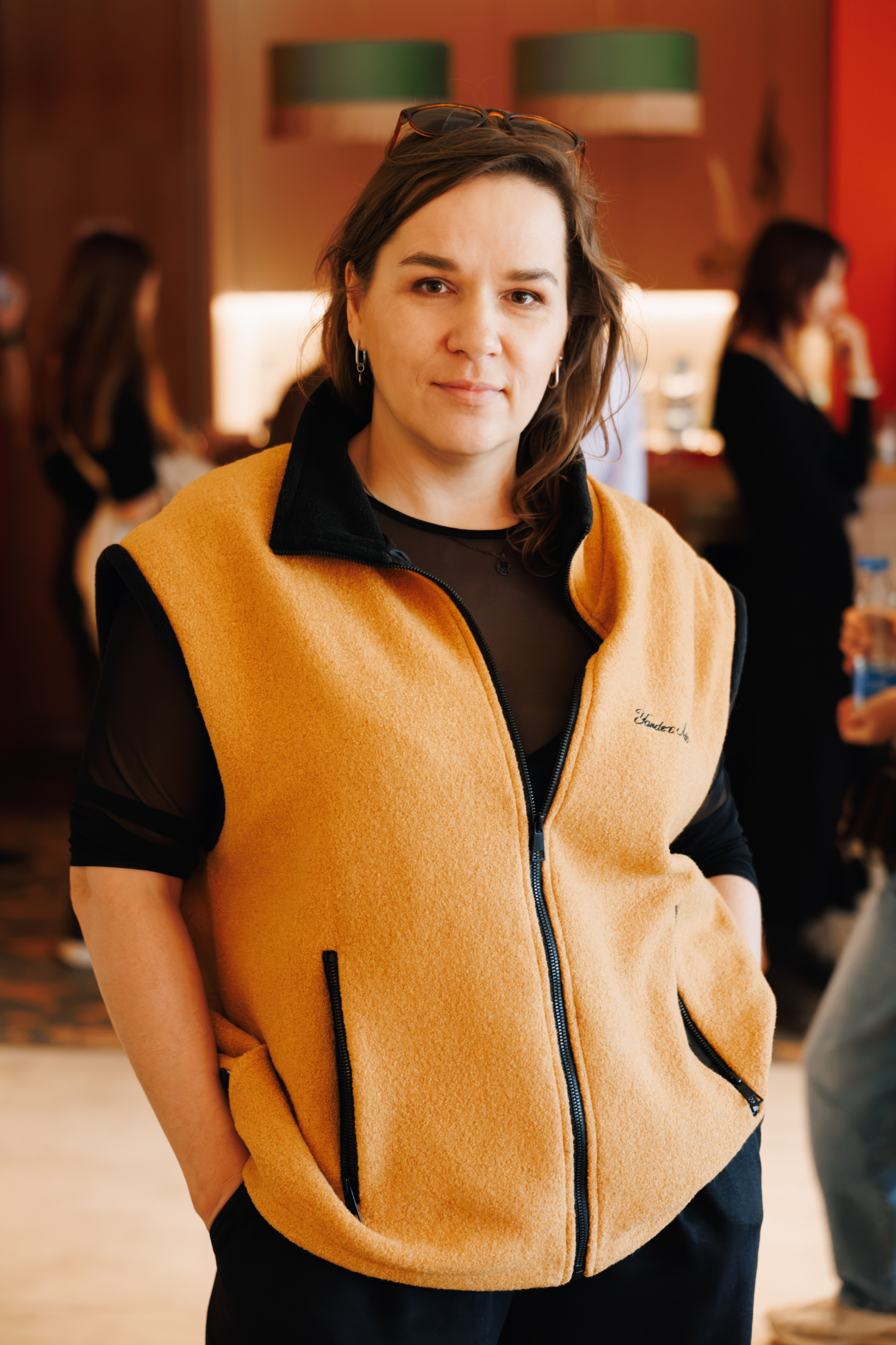 Maria in a yellow vest