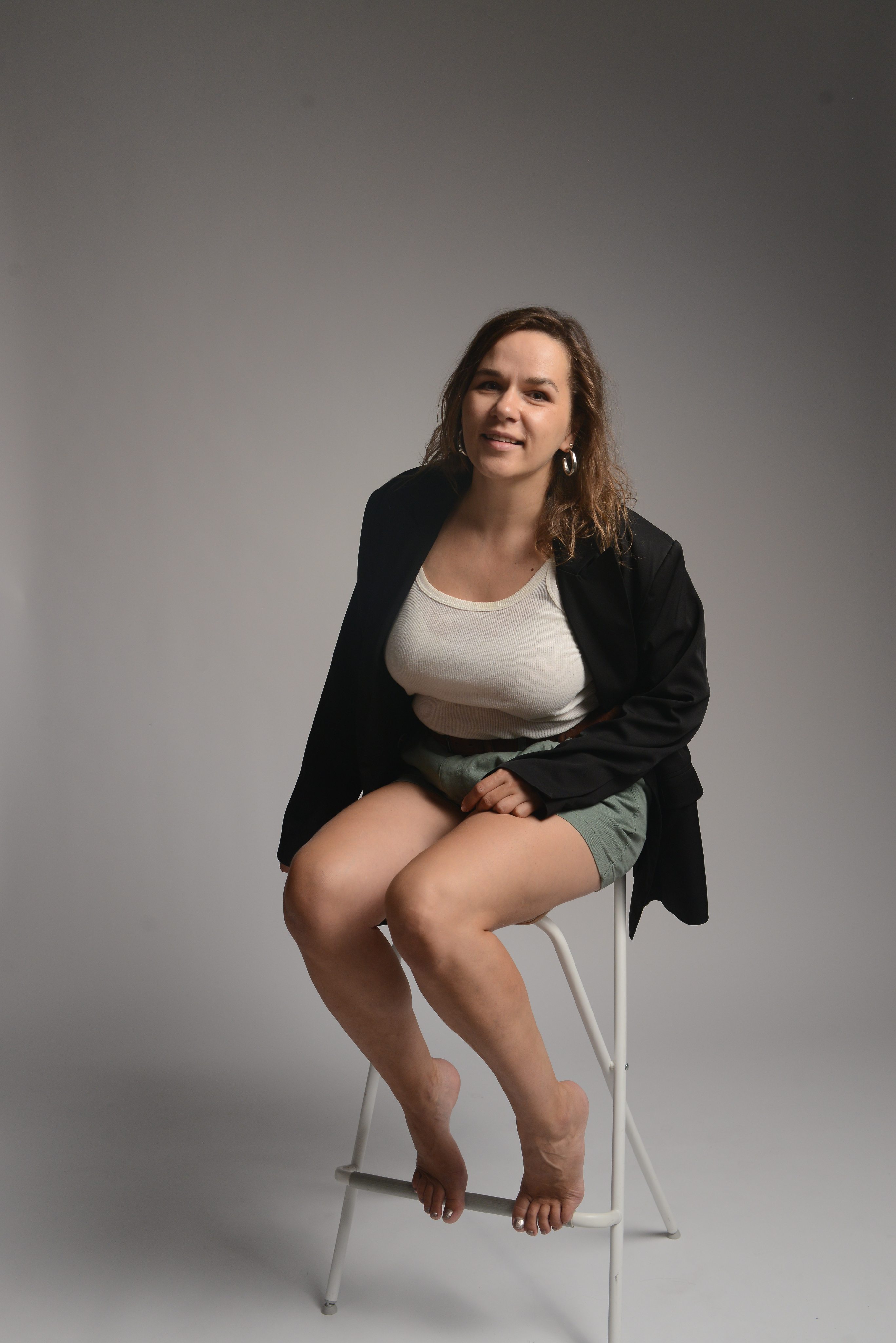 Maria sitting on a stool